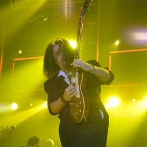 Above: Scientists are still unsure whether this creature urinates from its genital region or its belly button, though many speculate that the guitar is somehow involved in the process.